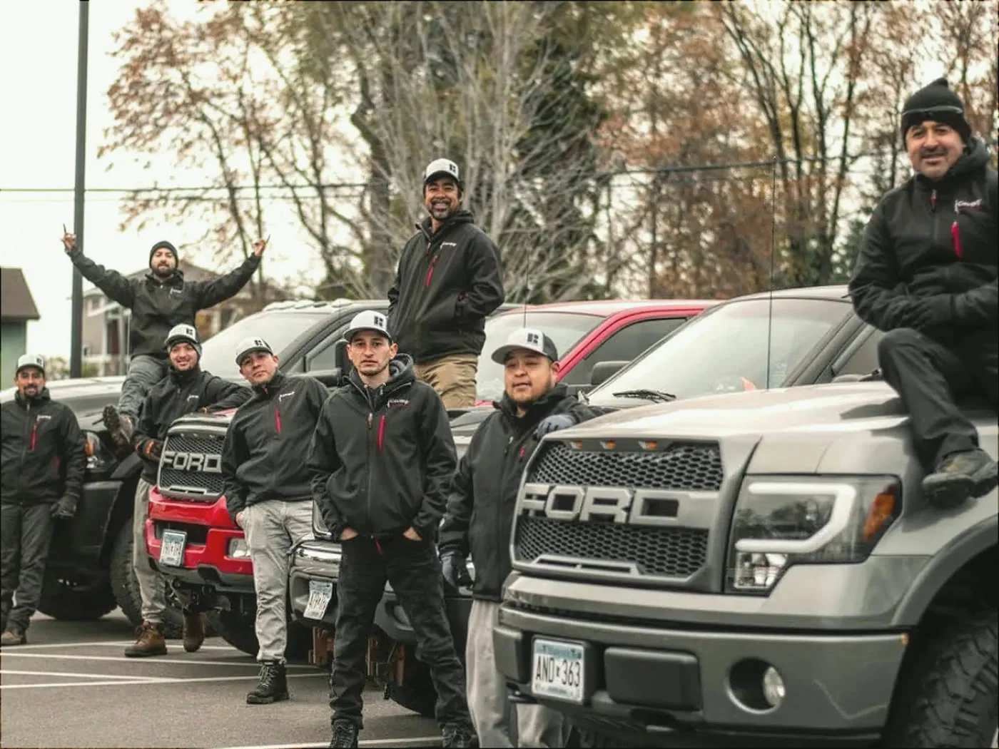 Cortez Landscaping crew with their trucks